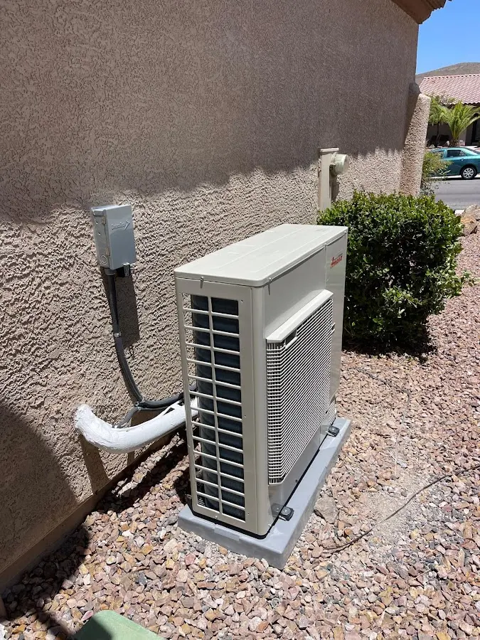 Residential air conditioning condenser unit in Ojus